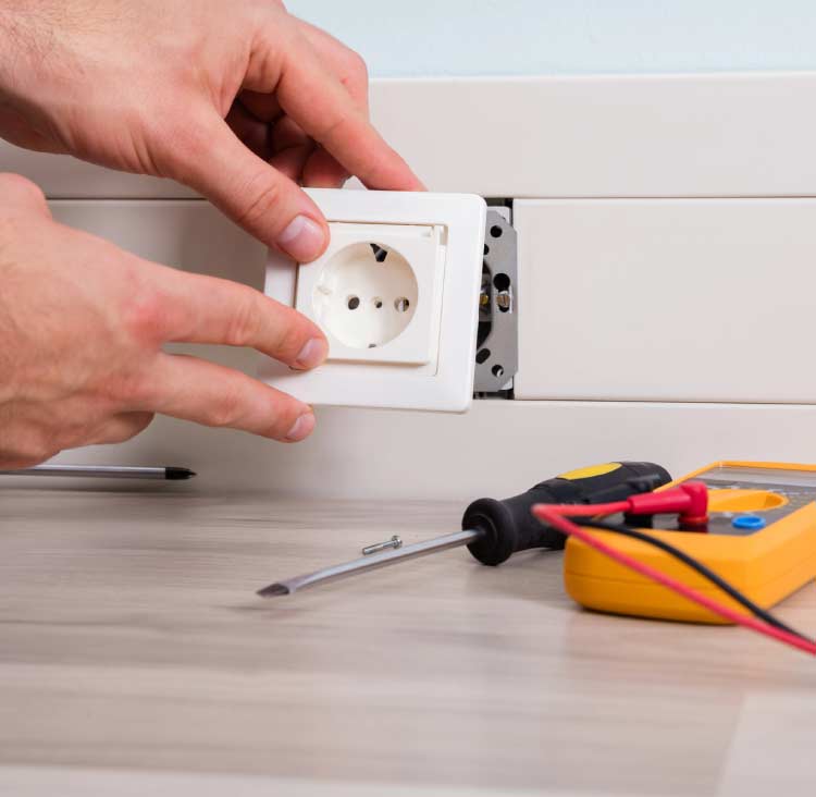 new-electrical-outlet certified electrician installing new GFCI electrical outlet installation in Salinas, CA kitchen